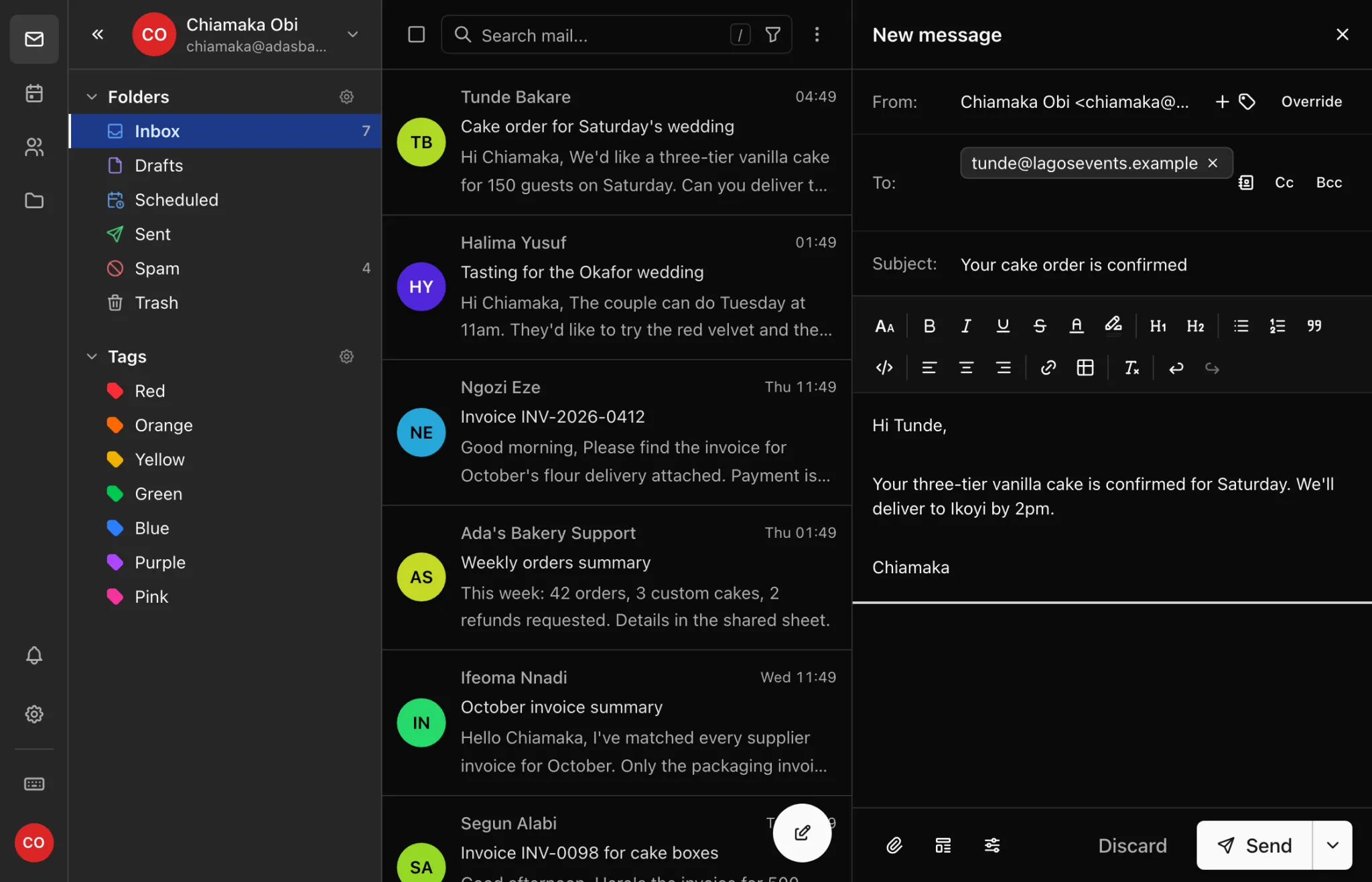 Writing an email in webmail, split between the light and dark themes