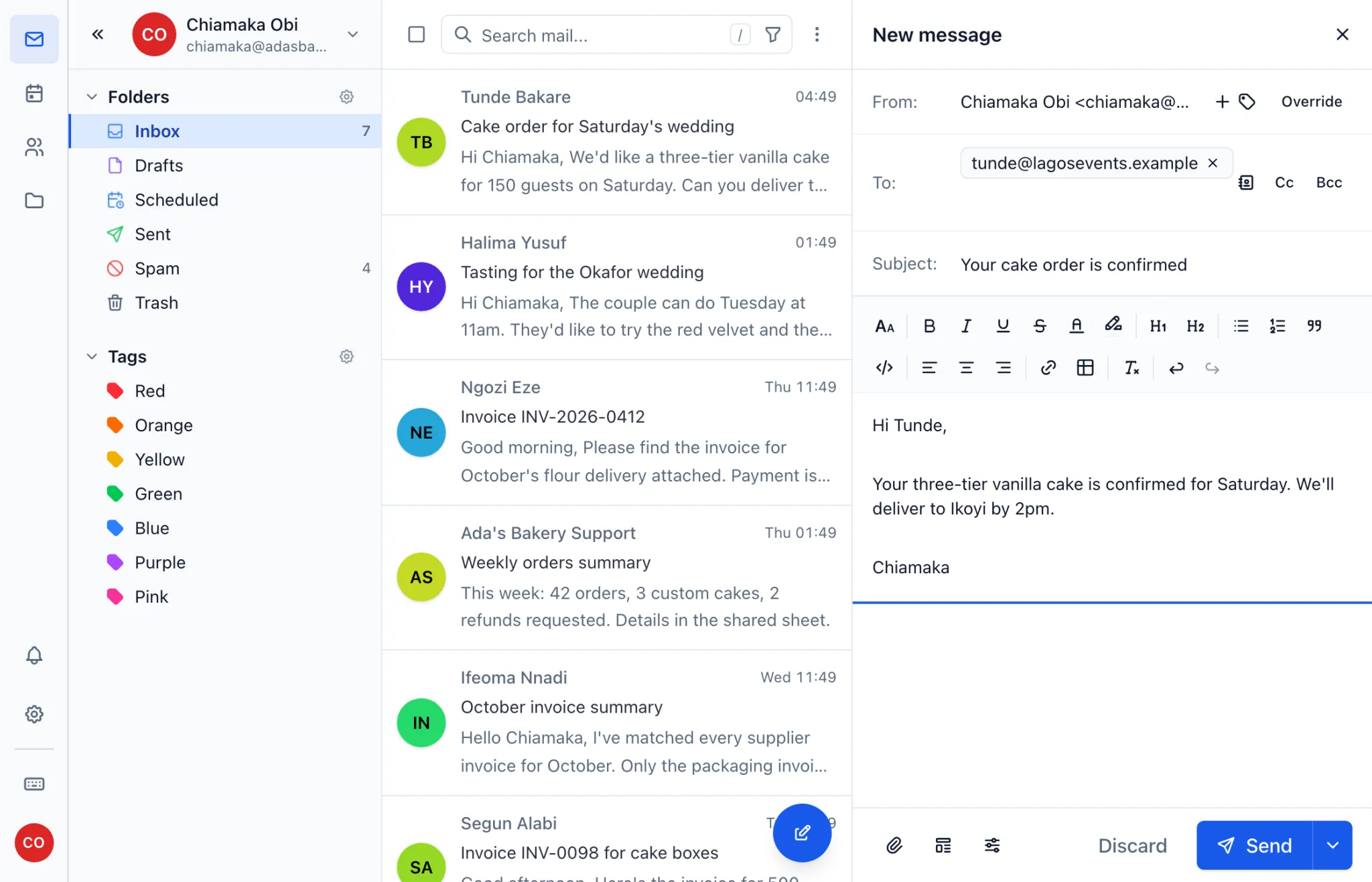 Writing an email in webmail, split between the light and dark themes