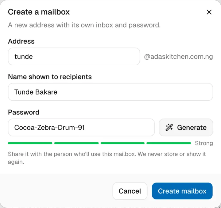 The Create a mailbox dialog with an address, a display name and a generated password